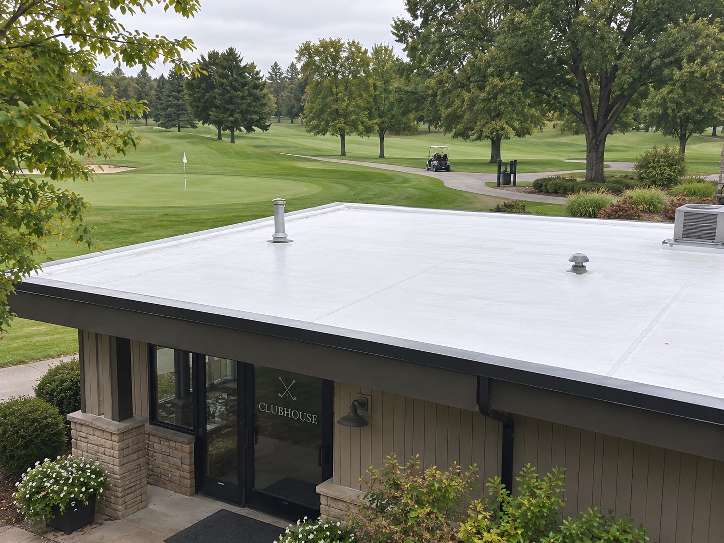 A clean white flat roof on a clubhouse in Salem, Oregon